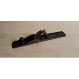 A Stanley Bailey No.8 adjustable jointer plane, with corrugated sole, rosewood handle and knob and