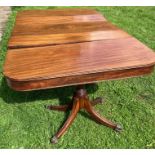 A 19th cent mahogany dining table