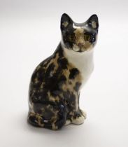 Winstanley tortoiseshell cat in a seated position. Height approx 24cm. Signature and number 4 to the