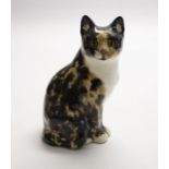 Winstanley tortoiseshell cat in a seated position. Height approx 24cm. Signature and number 4 to the