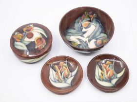 Moorcroft pottery - 'Tulip' design powder bowl, bowl (second quality), and two pin dishes