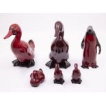 Five Royal Doulton Flambe ducks and Royal Doulton Flambe penguin, all in good condition (6)