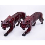 A pair of Royal Doulton Flambe tigers, 14cms high approx, 34cms long approx, both good condition