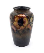 Moorcroft light flambe 'Anemone' pattern vase designed by William Moorcroft. Height approx 16cm.