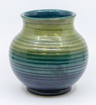 A Moorcroft ribbed green-to-blue vase (signed), approx. 15cm high. Condition: good, no damage or