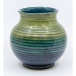 A Moorcroft ribbed green-to-blue vase (signed), approx. 15cm high. Condition: good, no damage or