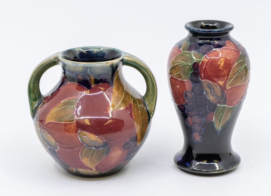 Two Moorcroft pieces including Pomegranate patterns: small baluster vase, signed, approx.10cm