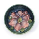 A Moorcroft Anemone pin dish. Diameter approx 8cm.