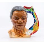 Royal Doulton Character Jug of Nelson Mandela. Pascoe & Co. Connoisseur, No.17. Size: 21cm H  In