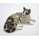 Winstanley cat in a resting position. Length approx 38cm. Signature and number 7 to the base. No