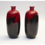 A pair of large Royal Doulton Flambe vases, 30cms high approx, both in good condition
