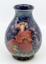 Moorcroft pottery: A Moorcroft 'Finch Blue' design baluster vase circa 1994. Height approx 19cm.