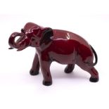 A Royal Doulton Flambe elephant, 14cms high approx, good condition
