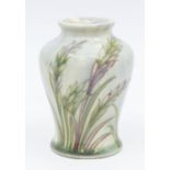 A small Moorcroft Waving Corn pattern vase, white glazed, signed, approx. 9cm high. Condition: good,