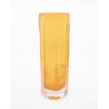 An orange glass vase, poss Whitefriars. Height approx 28.5cm. One minor chip to the edge.