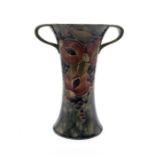 William Moorcroft for Liberty & Co 'Pomegranate' pattern twin handled vase. Height approx 20.5cm.