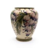 William Moorcroft for Macintyre & Co 'Wisteria' pattern ovoid vase. Height approx 19cm. Marks to the