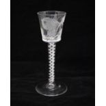 A Jacobite engraved single series opaque twist stem wine glass, circa??, engraved with a rose and