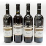 Four bottles of Italian wine:  Pio Cesare, Barolo, 2002, 2007, 2012 and Pio Casare, Nebbiolo,