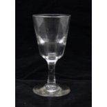 An early 19th century deceptive bowl toast master's glass, circa 1825, 12.7cm high, bowl 6cm diam,