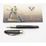 A Visconti Salvador Dali Dance of Time fountain pen, green resin with gold detail, melting clock