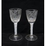 Two North European (Low Countries or Saxony) engraved double series opaque twist stem gin glass,