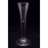 A very large ratafier or ale glass, circa 1740, the stem and bowl are drawn from a single gather,