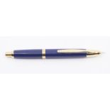 A Pilot retractable blue fountain pen, 18k gold nib