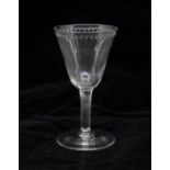 A Georgian incised twist stem wine glass, circa 1755-1760, oxo engraved and polished border on a