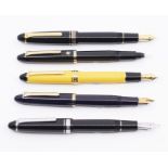 A collection of Sailor Japan pens, including two black bodied fountain pens with 21ct gold nib