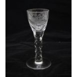 A 20th century copy Georgian wine glass, circa 1920, bowl engraved with flowers and bird in