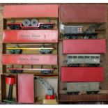 Hornby: A collection of eight assorted boxed Hornby O Gauge rolling stock wagons / trackside