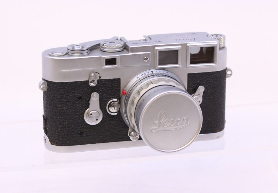 Leica: A Leica M3 camera body, 1045956, 1961, generally in good order, shutter appears to be in a