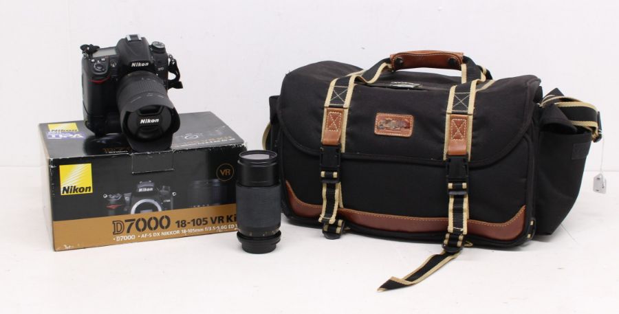 Nikon: A Nikon D7000 SLR camera body, 6284813, untested for working order, visually appears in