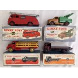 Dinky: A collection of four Dinky vehicles to include 531 Leyland Comet, 512 Guy Flat Truck, 955