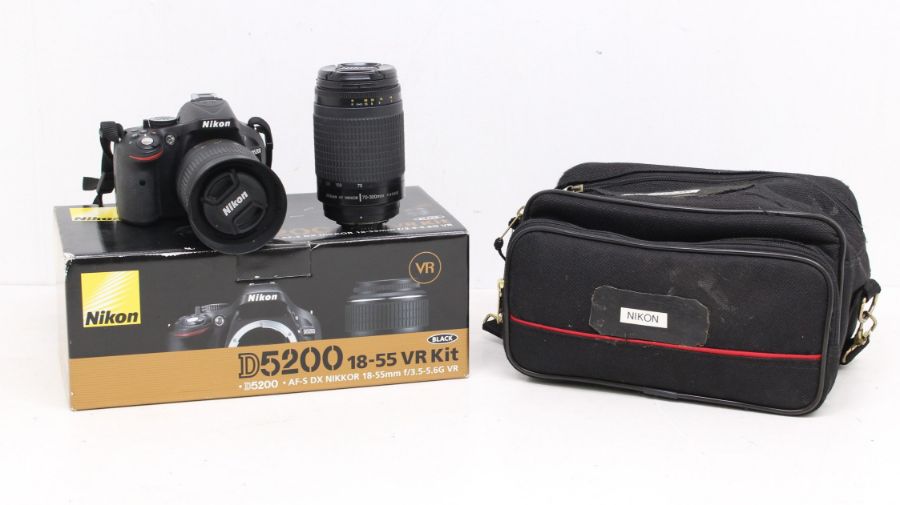 Nikon: A boxed Nikon D5200 camera body, 4438338, appears visually in good order, in need of a clean,