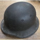 A German M34 Civic Police/Fire Helmet, no decals, original interior. slight corrosion to metal and