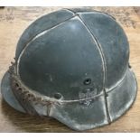 Scarce German WW2 helmet with late war camouflage wire for foliage/scrim.