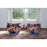 A pair of Japanese Imari porcelain large jardinieres circa 1900, each painted with birds and