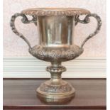 A George V silver campana shaped Wine Cooler, with lobed rim, pair of foliate cast scroll handles