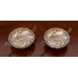 A Pair of Victorian silver two handled Dishes, spiral fluted and embossed flowers with leafy