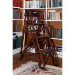 A set of Hatherley patent Lattistep triple-step mahogany library ladders, late 19th century, with