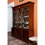 A Georgian style mahogany display cabinet, first half of 20th century, with shell inlaid frieze