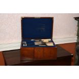 A silver plated Canteen of Cutlery, Fiddle Pattern in oak case fitted two drawers, including 12