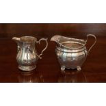 A George V silver baluster Cream Jug with scroll handle, Birmingham 1932, F.C. Richards, 9cm high,