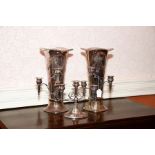 A silver plated nine branch Epergne on oval base and Pair of silver plated Vases embossed ribbon