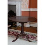 A George II mahogany snap top circular supper table, circa 1750-60, with later adapted bird-cage