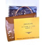 Jaguar E Type, Series 2, operating manual & service handbook, c. 1960, in original wallet,