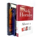 Hornby, Nick. About a Boy, signed first edition, 1998, wrapper with closed split top corner, tog. w/