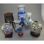 A group of modern Chinese ceramics, to include vases, ginger jars, a jug a bottle and a wooden